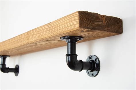 metal pipe brackets for shelves|rustic pipe shelf brackets.